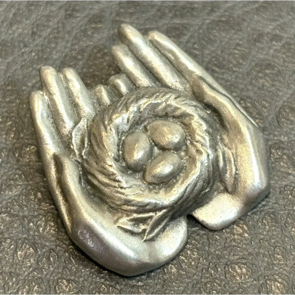 Vintage 1989 GUYOT Pewter Hands Holding Birds Nest With Eggs Brooch Pin